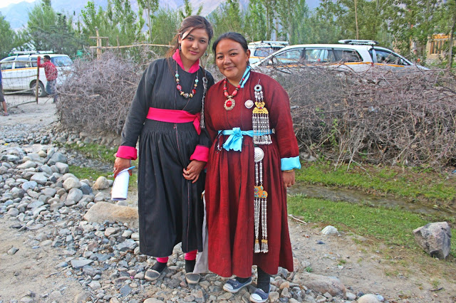 In their traditional dress