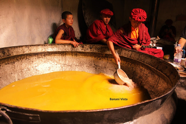 The young monks serving butter tea
