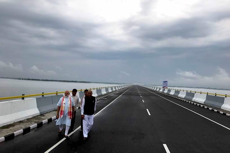 Prime Minister, Narendra Modi walking over Dhola-Sadia.