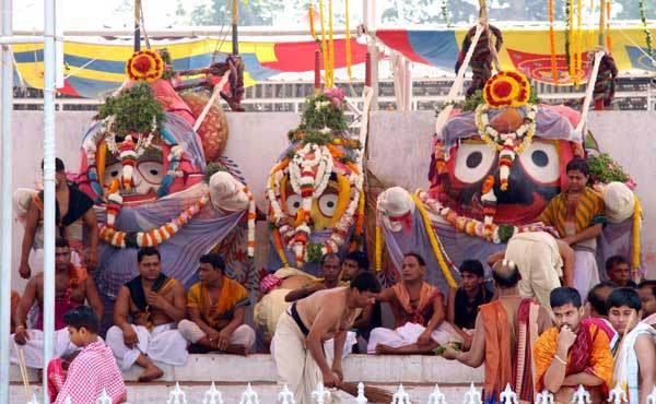 The deities being given a ceremonial bath