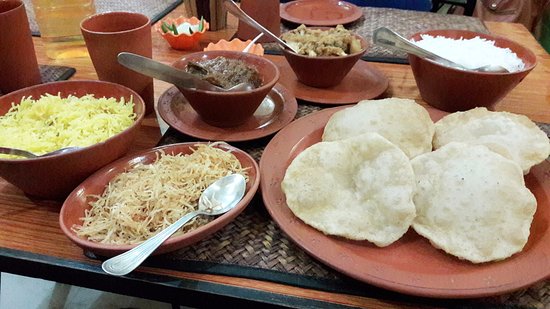 Relish the Mutton curry in Saptapadi