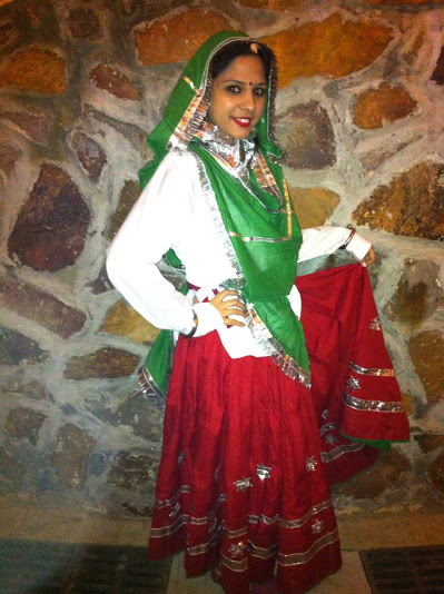 The flairy skirt, colorful dupatta, and ethnic jewelry