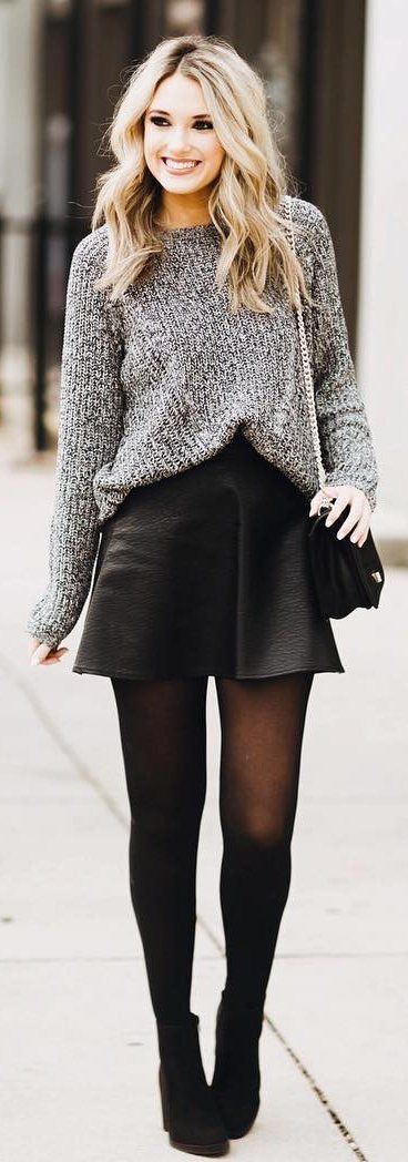 Mini skirt with comfortable sweater paired up with stockings