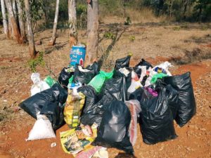 The group collects massive amount of garbage from the forest