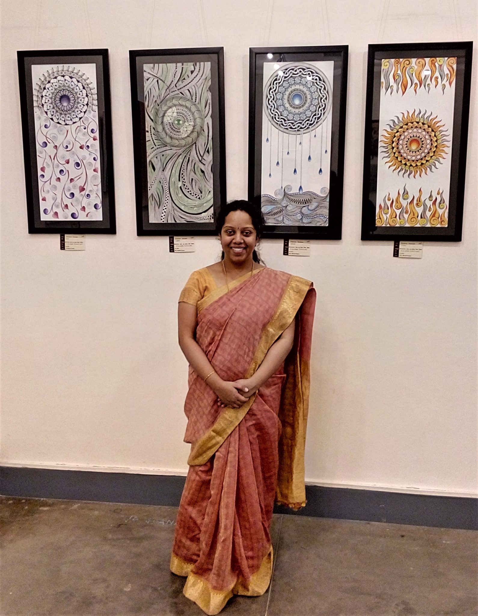 Vandana Krishna with her abstract artwork
