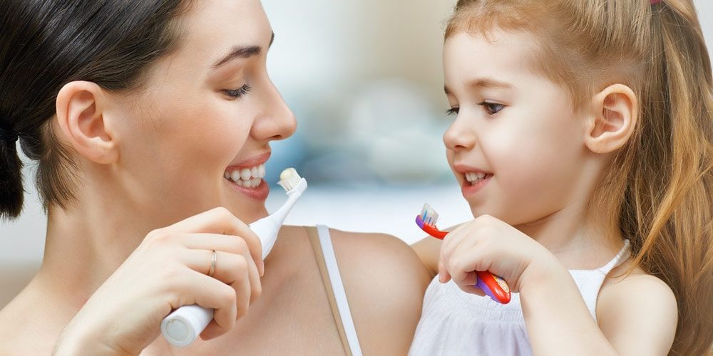Teach brushing to your kids